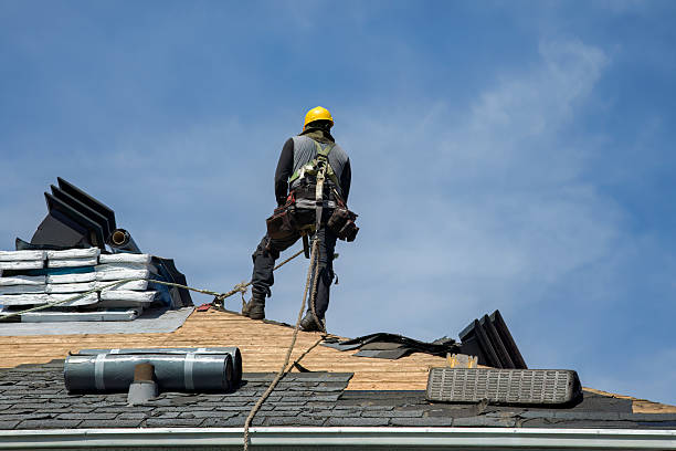 Professional Roofing technician working in South Walpole, MA